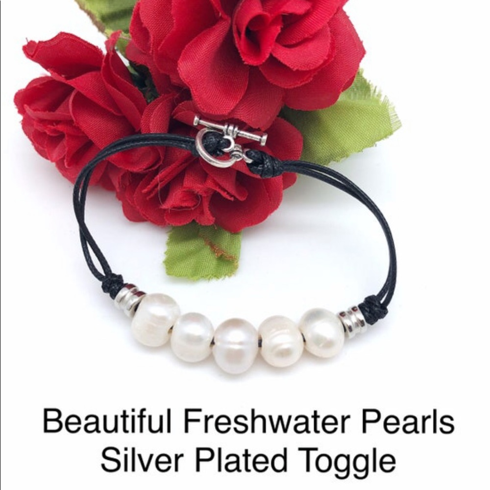 White Freshwater Pearl Toggle Bracelet 

7” to 8” on Black Double Waxed Cord NEW
